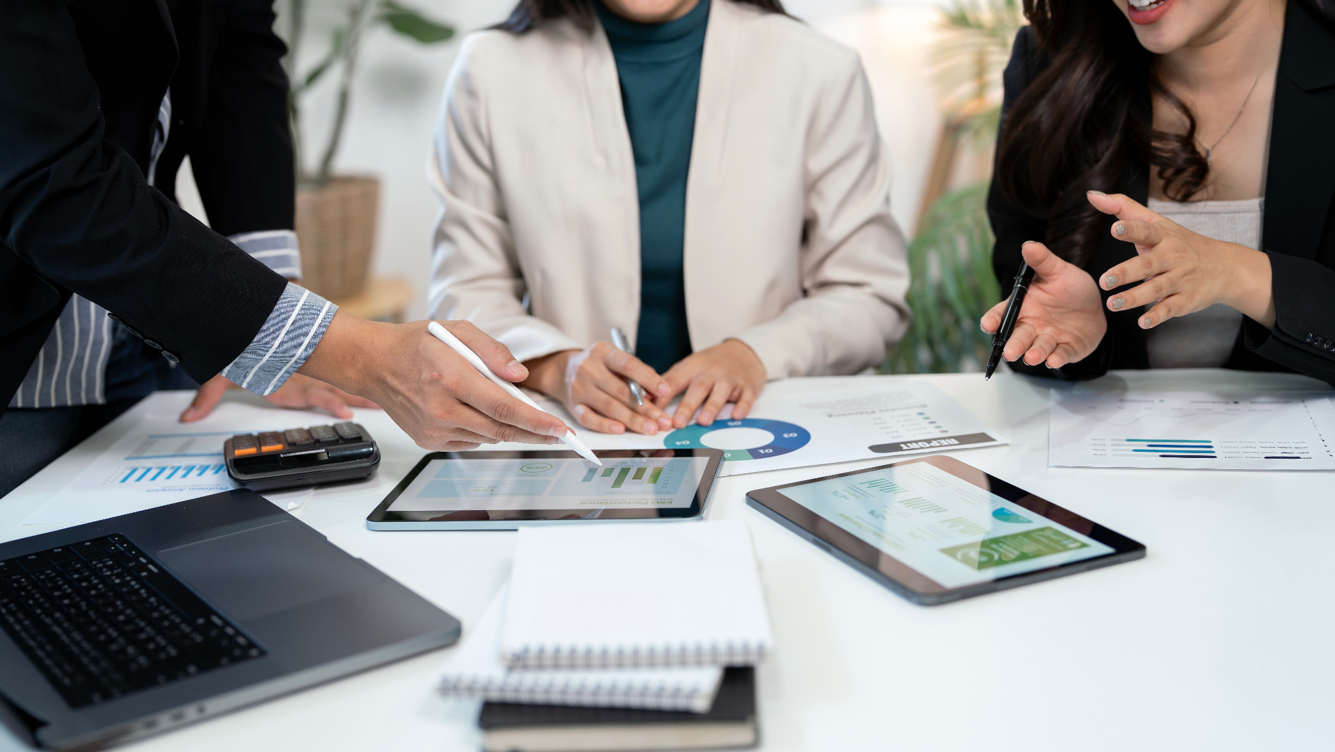 Financial analysis meeting around a table